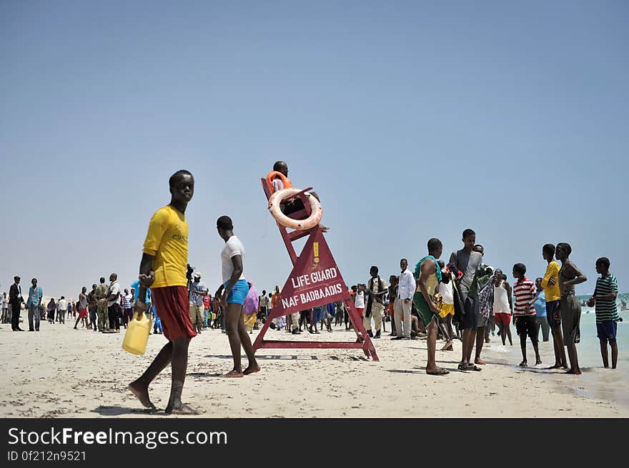 A lifeguard sits watch on LIdo beach in Mogadishu, Somalia, on January 31. The Mogadishu lifeguards, consisting entirely of a volunteer force of fisherman, began patrolling Lido beach in September 2013 after a spate of drownings. Mogadishu&#x27;s beaches have become a popular destination for the city&#x27;s residents since al Shabab withdrew the majority of its militants from the city in 2011. AU UN IST PHOTO / Tobin Jones. A lifeguard sits watch on LIdo beach in Mogadishu, Somalia, on January 31. The Mogadishu lifeguards, consisting entirely of a volunteer force of fisherman, began patrolling Lido beach in September 2013 after a spate of drownings. Mogadishu&#x27;s beaches have become a popular destination for the city&#x27;s residents since al Shabab withdrew the majority of its militants from the city in 2011. AU UN IST PHOTO / Tobin Jones