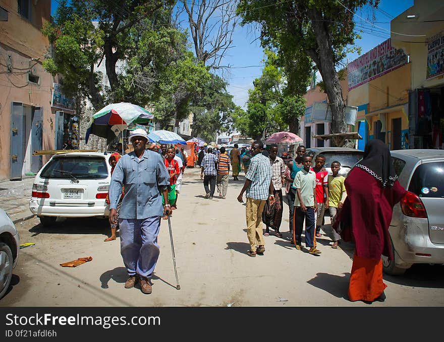 General street scene in Hamar Weyne market in the Somali capital Mogadishu, 05 August, 2013. 06 August marks 2 years since the Al Qaeda-affiliated extremist group Al Shabaab withdrew from Mogadishu following sustained operations by forces of the Somali National Army &#x28;SNA&#x29; backed by troops of the African Union Mission in Somalia &#x28;AMISOM&#x29; to retake the city. Since the group&#x27;s departure the country&#x27;s captial has re-established itself and a sense of normality has returned. Buildings and infrastructure devastated and destroyed by two decades of conflict have been repaired; thousands of Diaspora Somalis have returned home to invest and help rebuild their nation; foreign embassies and diplomatic missions have reopened and for the first time in many years, Somalia has an internationally recognised government.. AU-UN IST PHOTO / STUART PRICE. General street scene in Hamar Weyne market in the Somali capital Mogadishu, 05 August, 2013. 06 August marks 2 years since the Al Qaeda-affiliated extremist group Al Shabaab withdrew from Mogadishu following sustained operations by forces of the Somali National Army &#x28;SNA&#x29; backed by troops of the African Union Mission in Somalia &#x28;AMISOM&#x29; to retake the city. Since the group&#x27;s departure the country&#x27;s captial has re-established itself and a sense of normality has returned. Buildings and infrastructure devastated and destroyed by two decades of conflict have been repaired; thousands of Diaspora Somalis have returned home to invest and help rebuild their nation; foreign embassies and diplomatic missions have reopened and for the first time in many years, Somalia has an internationally recognised government.. AU-UN IST PHOTO / STUART PRICE.