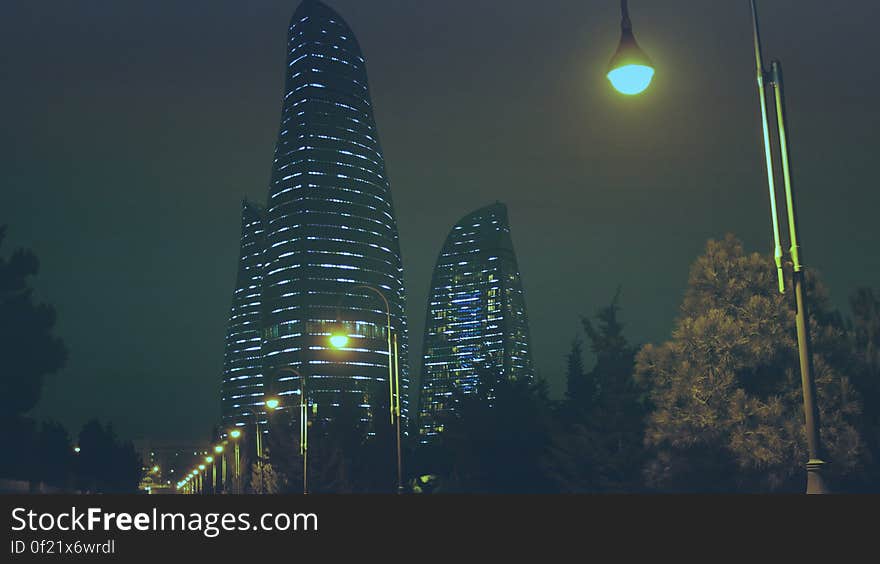 Skyscrapers and street lighting at night. Skyscrapers and street lighting at night.