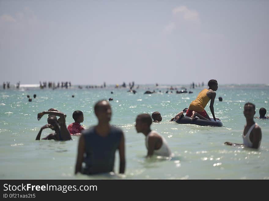 Residents of Mogadishu, Somalia, enjoy the waters off of Lido beach on January 31. The Mogadishu lifeguards, consisting entirely of a volunteer force of fisherman, began patrolling Lido beach in September 2013 after a spate of drownings. Mogadishu&#x27;s beaches have become a popular destination for the city&#x27;s residents since al Shabab withdrew the majority of its militants from the city in 2011. AU UN IST PHOTO / Tobin Jones. Residents of Mogadishu, Somalia, enjoy the waters off of Lido beach on January 31. The Mogadishu lifeguards, consisting entirely of a volunteer force of fisherman, began patrolling Lido beach in September 2013 after a spate of drownings. Mogadishu&#x27;s beaches have become a popular destination for the city&#x27;s residents since al Shabab withdrew the majority of its militants from the city in 2011. AU UN IST PHOTO / Tobin Jones