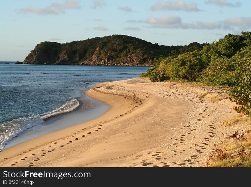 looking down long bay beach