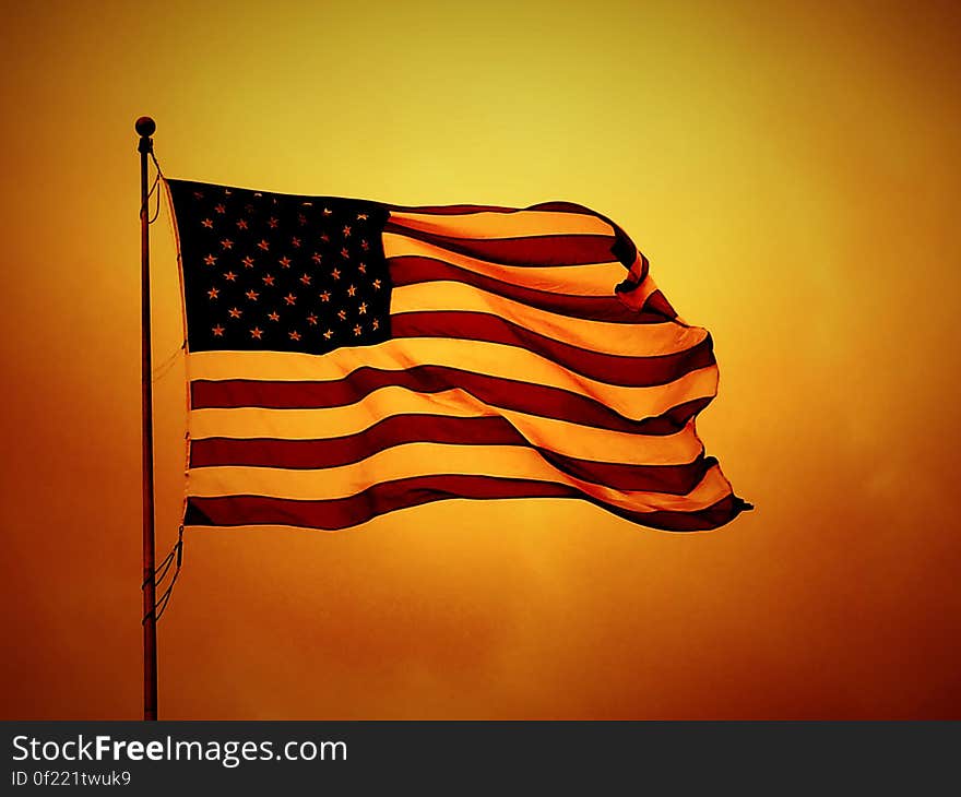 USA flag on yellow backdrop