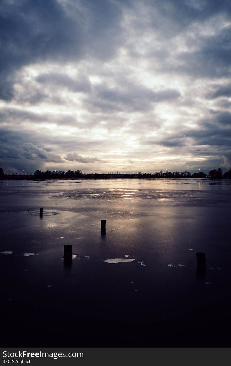 Nimbus Clouds Above Water during Daytime