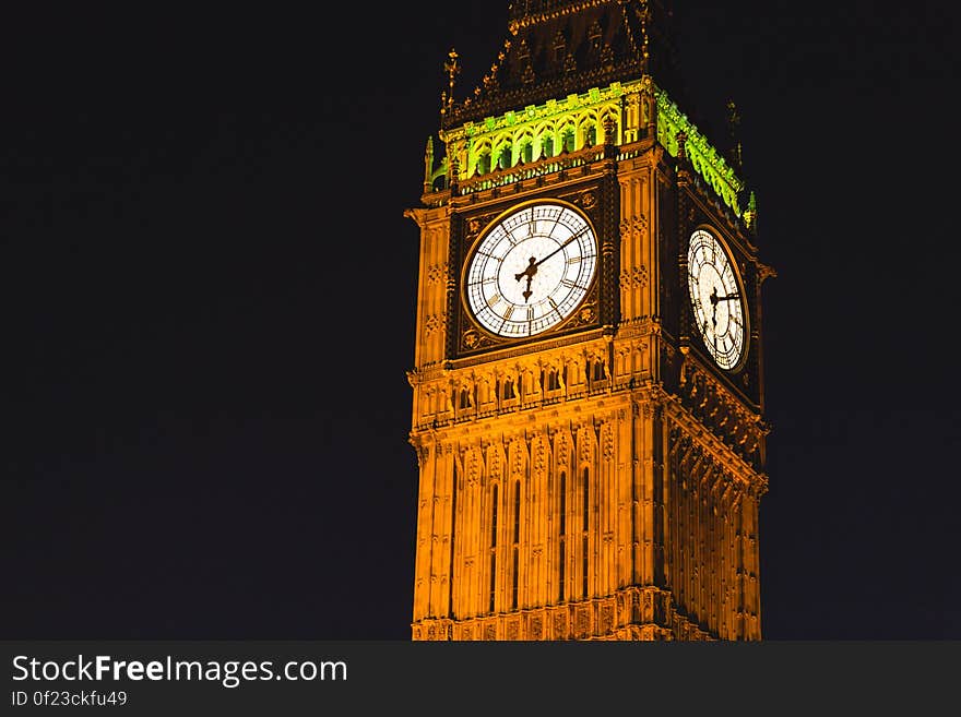 Brown Elizabeth Tower during Night Time