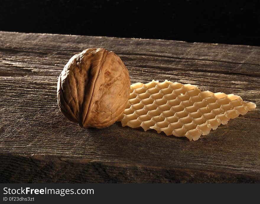 Brown Walnut on Brown Wooden Surface