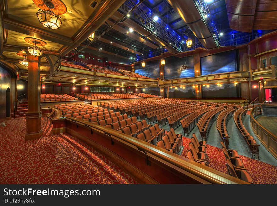 Orange Chairs Inside Theater Room