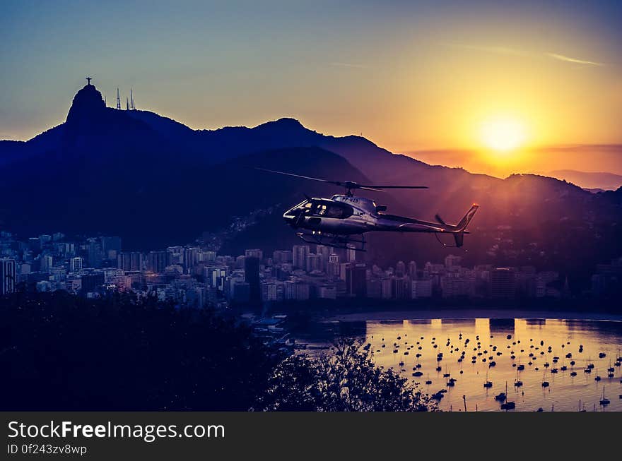 Aerial Photography of Helicopter during Twilight