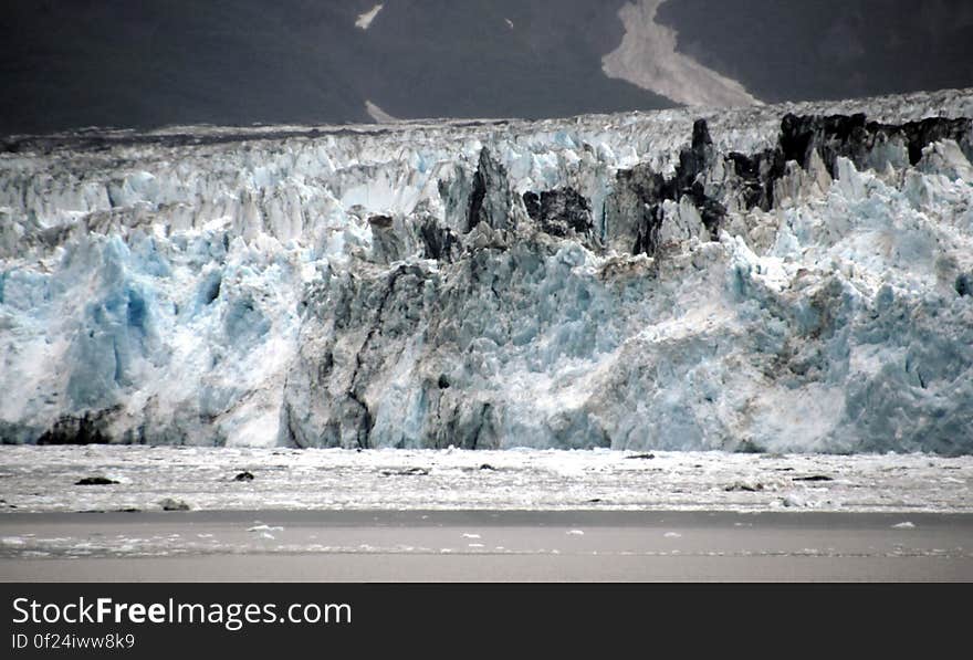 The longest source for Hubbard Glacier originates 122 kilometres &#x28;76 mi&#x29; from its snout and is located at about 61°00′N 140°09′W, approximately 8 kilometres &#x28;5 mi&#x29; west of Mount Walsh with an altitude around 11,000 feet &#x28;3,400 m&#x29;. A shorter tributary glacier begins at the easternmost summit on the Mount Logan ridge at about 18,300 feet &#x28;5,600 m&#x29; at about 60°35′0″N 140°22′40″W. Before it reaches the sea, Hubbard is joined by the Valerie Glacier to the west, which, through forward surges of its own ice, has contributed to the advance of the ice flow that experts believe will eventually dam the Russell Fjord from Disenchantment Bay waters. The longest source for Hubbard Glacier originates 122 kilometres &#x28;76 mi&#x29; from its snout and is located at about 61°00′N 140°09′W, approximately 8 kilometres &#x28;5 mi&#x29; west of Mount Walsh with an altitude around 11,000 feet &#x28;3,400 m&#x29;. A shorter tributary glacier begins at the easternmost summit on the Mount Logan ridge at about 18,300 feet &#x28;5,600 m&#x29; at about 60°35′0″N 140°22′40″W. Before it reaches the sea, Hubbard is joined by the Valerie Glacier to the west, which, through forward surges of its own ice, has contributed to the advance of the ice flow that experts believe will eventually dam the Russell Fjord from Disenchantment Bay waters.