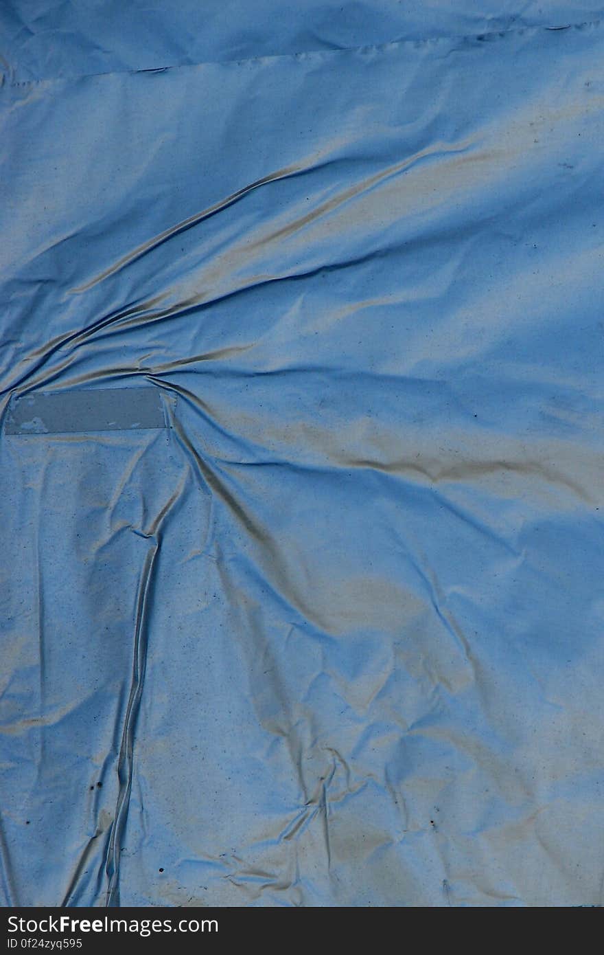 wrinkled blue paper