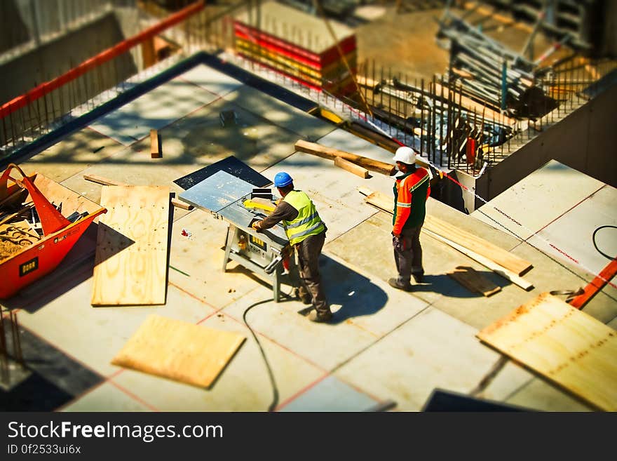 2 Man on Construction Site during Daytime