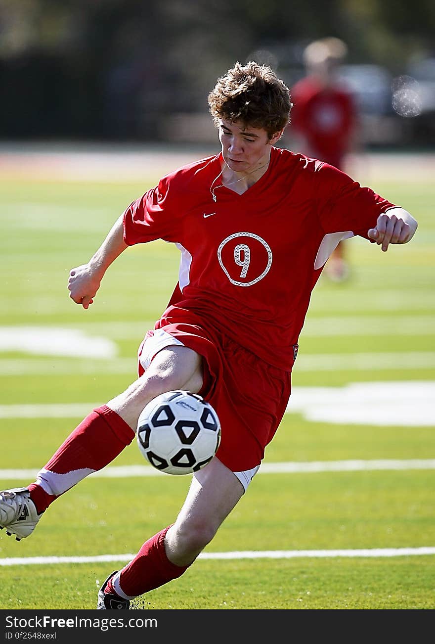 Person Playing Soccer