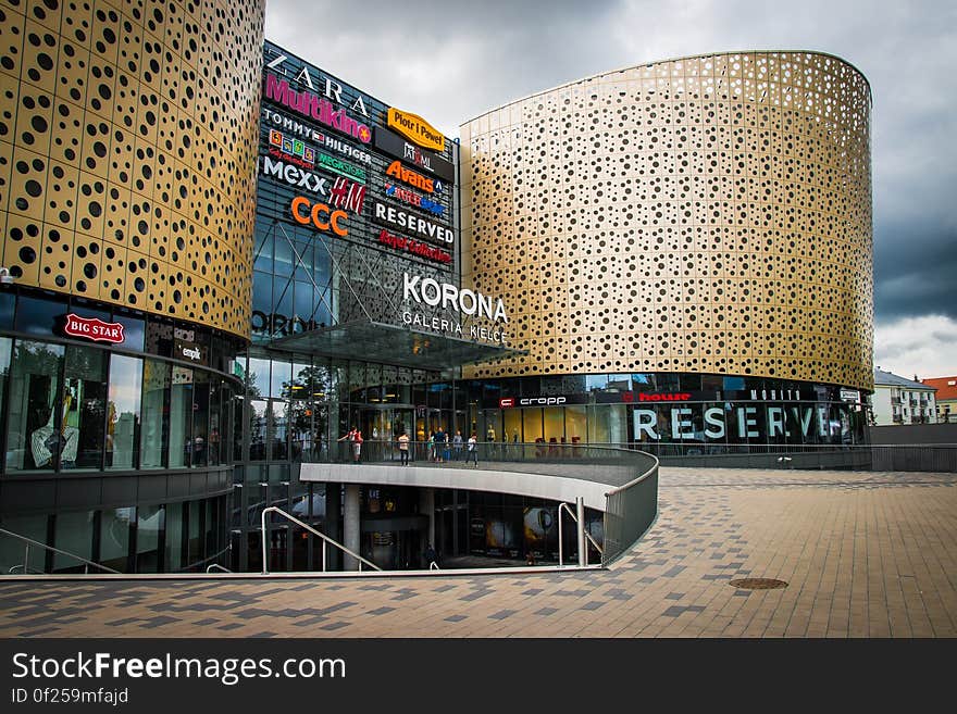 Modern exterior of a shopping mall and advertisements on the facade. Modern exterior of a shopping mall and advertisements on the facade.