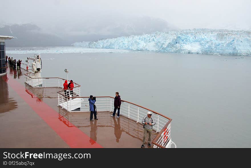 The longest source for Hubbard Glacier originates 122 kilometres &#x28;76 mi&#x29; from its snout and is located at about 61°00′N 140°09′W, approximately 8 kilometres &#x28;5 mi&#x29; west of Mount Walsh with an altitude around 11,000 feet &#x28;3,400 m&#x29;. A shorter tributary glacier begins at the easternmost summit on the Mount Logan ridge at about 18,300 feet &#x28;5,600 m&#x29; at about 60°35′0″N 140°22′40″W. Before it reaches the sea, Hubbard is joined by the Valerie Glacier to the west, which, through forward surges of its own ice, has contributed to the advance of the ice flow that experts believe will eventually dam the Russell Fjord from Disenchantment Bay waters. The longest source for Hubbard Glacier originates 122 kilometres &#x28;76 mi&#x29; from its snout and is located at about 61°00′N 140°09′W, approximately 8 kilometres &#x28;5 mi&#x29; west of Mount Walsh with an altitude around 11,000 feet &#x28;3,400 m&#x29;. A shorter tributary glacier begins at the easternmost summit on the Mount Logan ridge at about 18,300 feet &#x28;5,600 m&#x29; at about 60°35′0″N 140°22′40″W. Before it reaches the sea, Hubbard is joined by the Valerie Glacier to the west, which, through forward surges of its own ice, has contributed to the advance of the ice flow that experts believe will eventually dam the Russell Fjord from Disenchantment Bay waters.