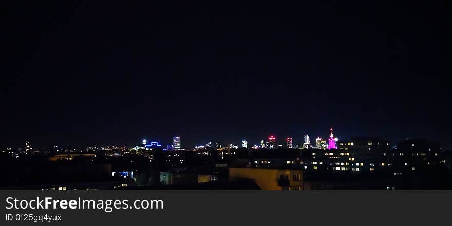 The skyline of a city at night. The skyline of a city at night.