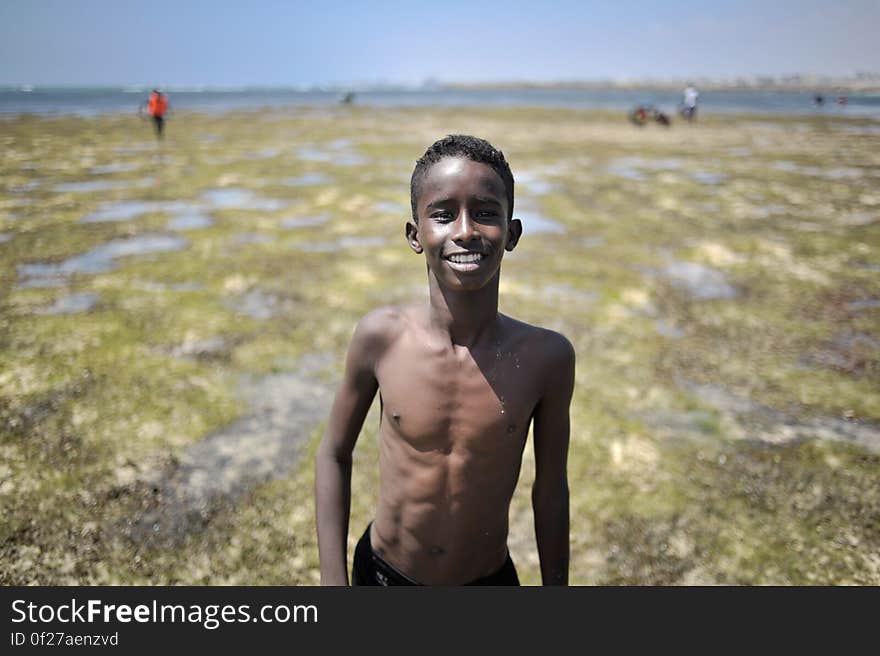 A young boy enjoys a day out at Lido beach in Mogadishu, Somalia, on January 31. The Mogadishu lifeguards, consisting entirely of a volunteer force of fisherman, began patrolling Lido beach in September 2013 after a spate of drownings. Mogadishu&#x27;s beaches have become a popular destination for the city&#x27;s residents since al Shabab withdrew the majority of its militants from the city in 2011. AU UN IST PHOTO / Tobin Jones. A young boy enjoys a day out at Lido beach in Mogadishu, Somalia, on January 31. The Mogadishu lifeguards, consisting entirely of a volunteer force of fisherman, began patrolling Lido beach in September 2013 after a spate of drownings. Mogadishu&#x27;s beaches have become a popular destination for the city&#x27;s residents since al Shabab withdrew the majority of its militants from the city in 2011. AU UN IST PHOTO / Tobin Jones