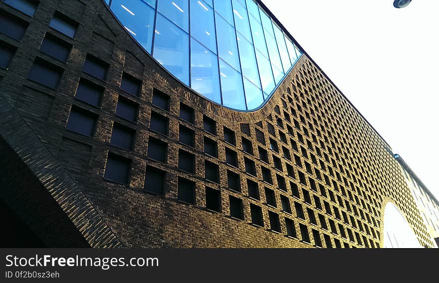 The facade of a building with large windows. The facade of a building with large windows.