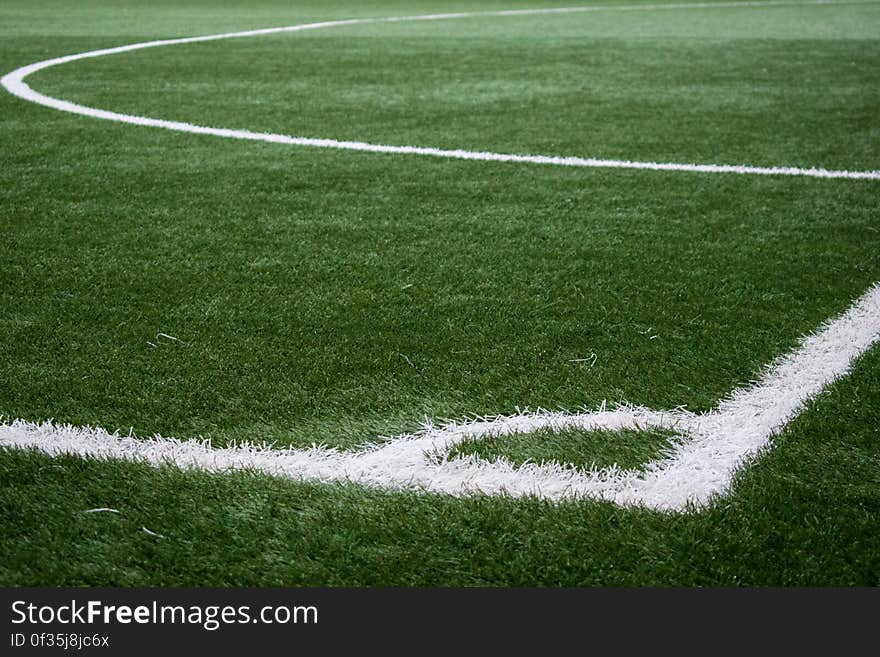 Close up of sideline and corner of grass soccer sports field.