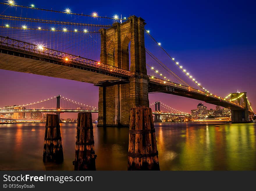 Brooklyn Bridge in New York City at night.