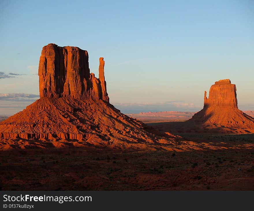 Brown Rock Formation Mountain over Blue Clear Sky during Daytime