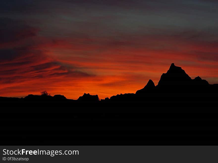 Silhouette Photo of Mountains during Golden Hour