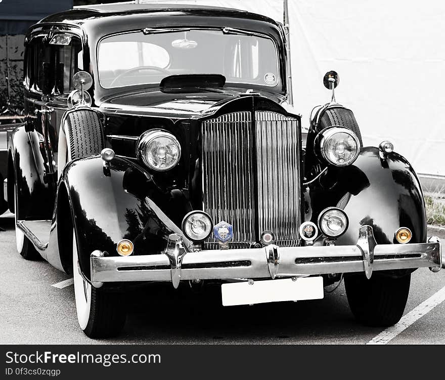 A black and white vintage car front.