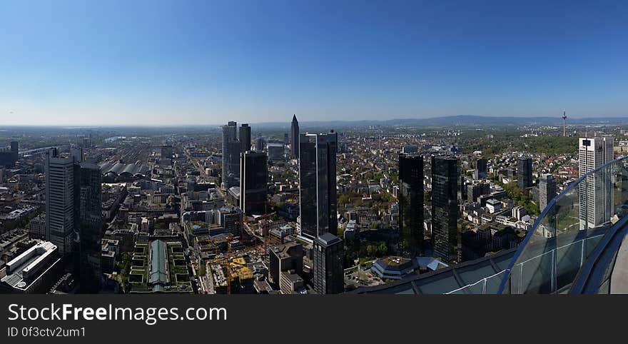 A panoramic view of a city with skyscrapers. A panoramic view of a city with skyscrapers.