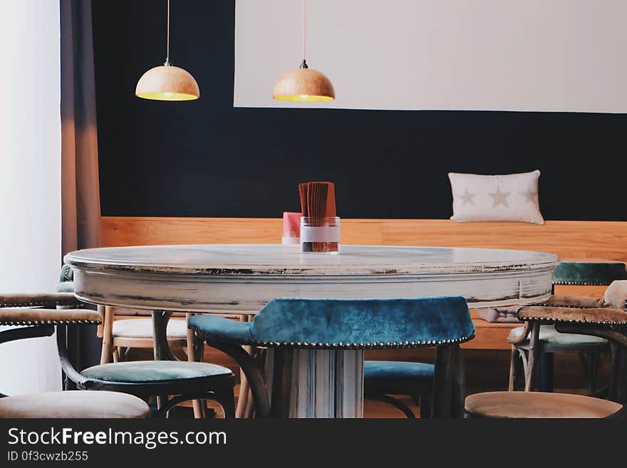 A round table in a coffee house. A round table in a coffee house.