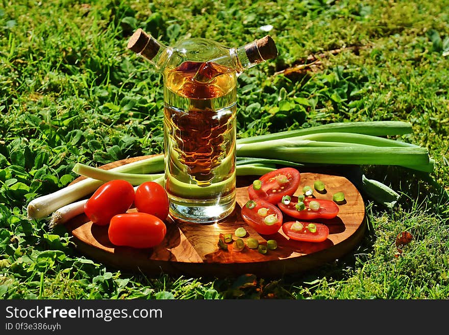 Green Onion Spring Near Clear Glass Container