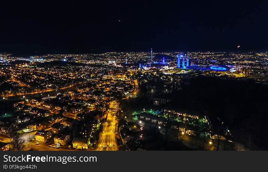 City skyline illuminated at night. City skyline illuminated at night.