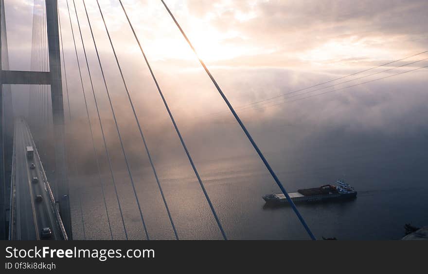 Sailboat on Sea Against Dramatic Sky