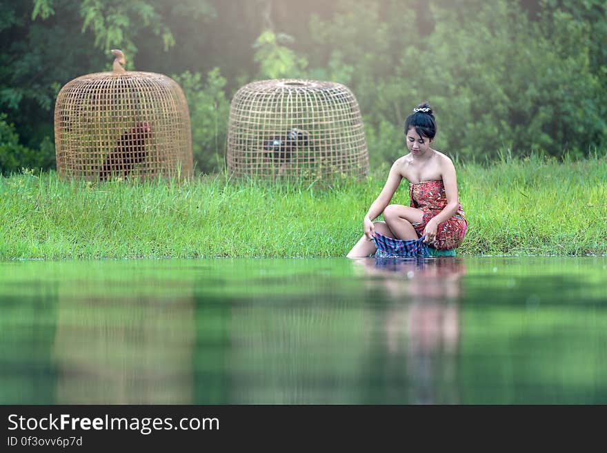 Full Length of Boy Sitting on Grass