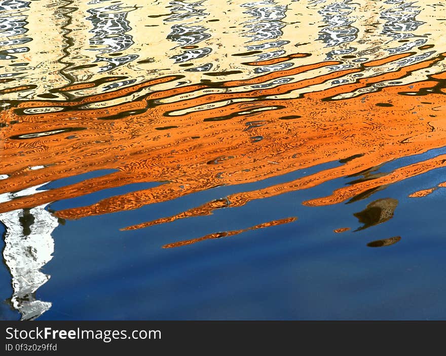 Surface of water reflecting colors. Surface of water reflecting colors.