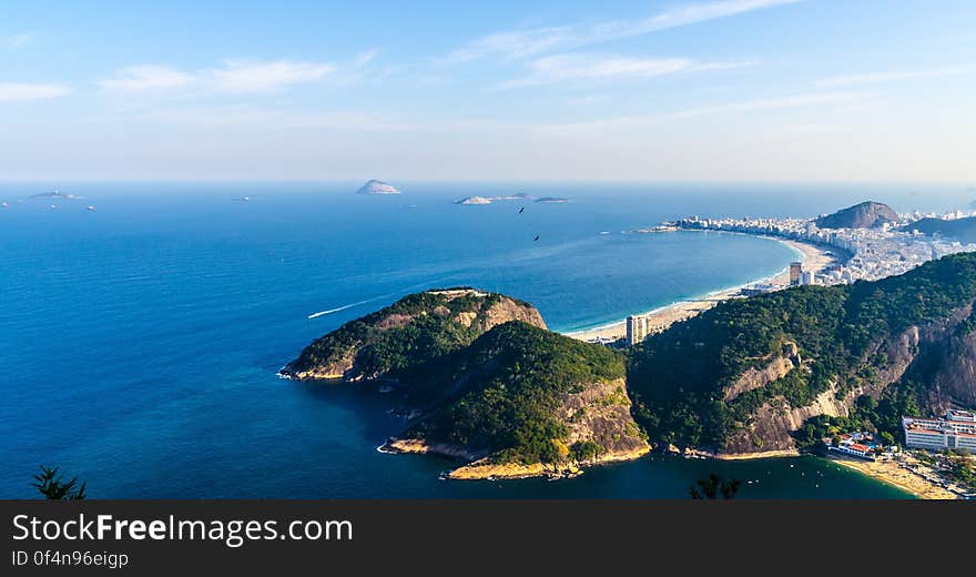 Panoramic view of Copacabana Beach in Rio De Janeiro, Brazil, and the landscape around. Panoramic view of Copacabana Beach in Rio De Janeiro, Brazil, and the landscape around.