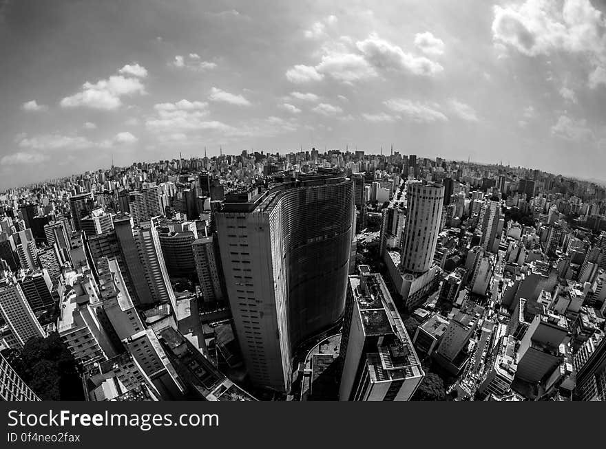 High Angle View of Cityscape Against Cloudy Sky