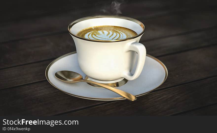 White Ceramic Mug Beside Gold Spoon