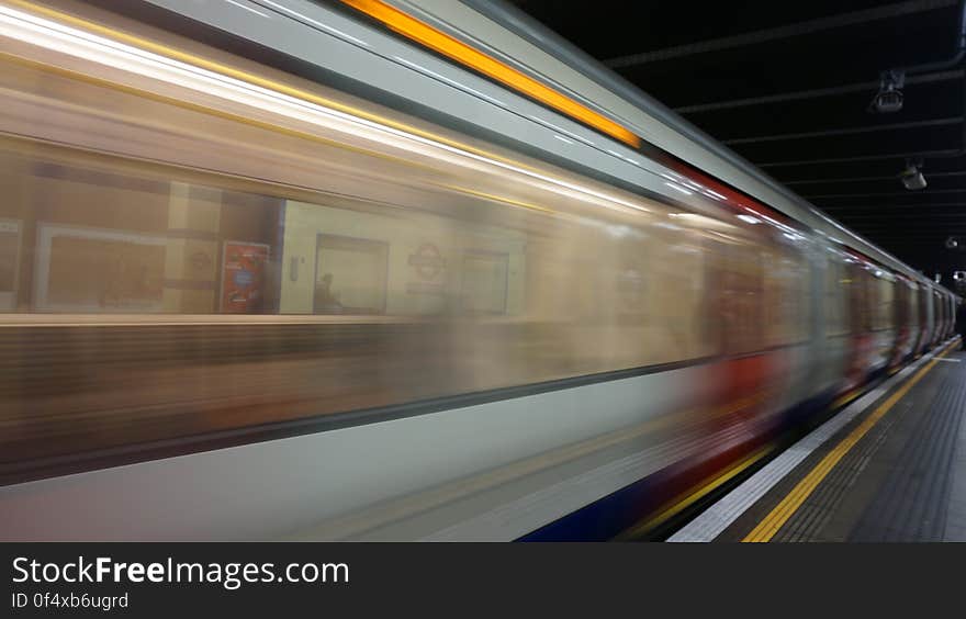 Blurred Motion of Train at Railroad Station