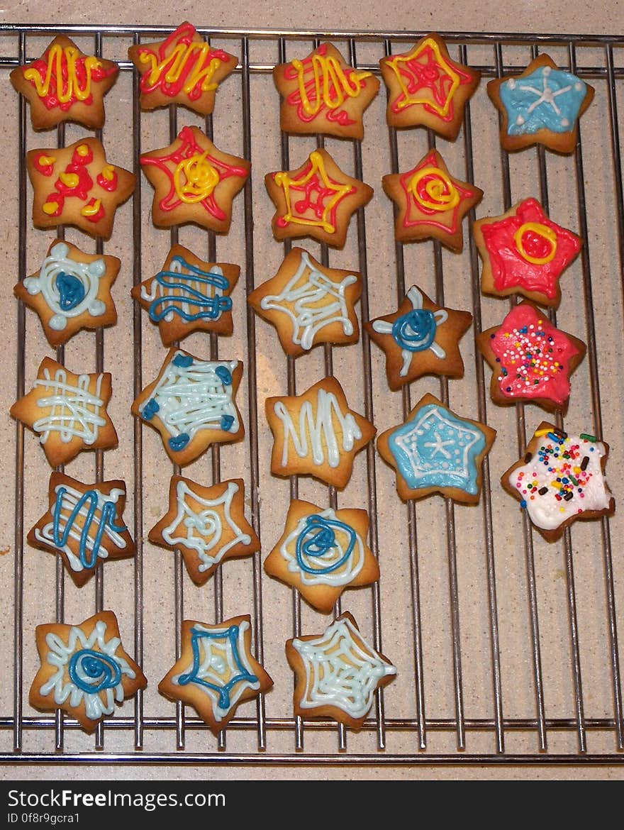 Little stars cut from space around big cookies, and unfortunately overbaked. Little stars cut from space around big cookies, and unfortunately overbaked