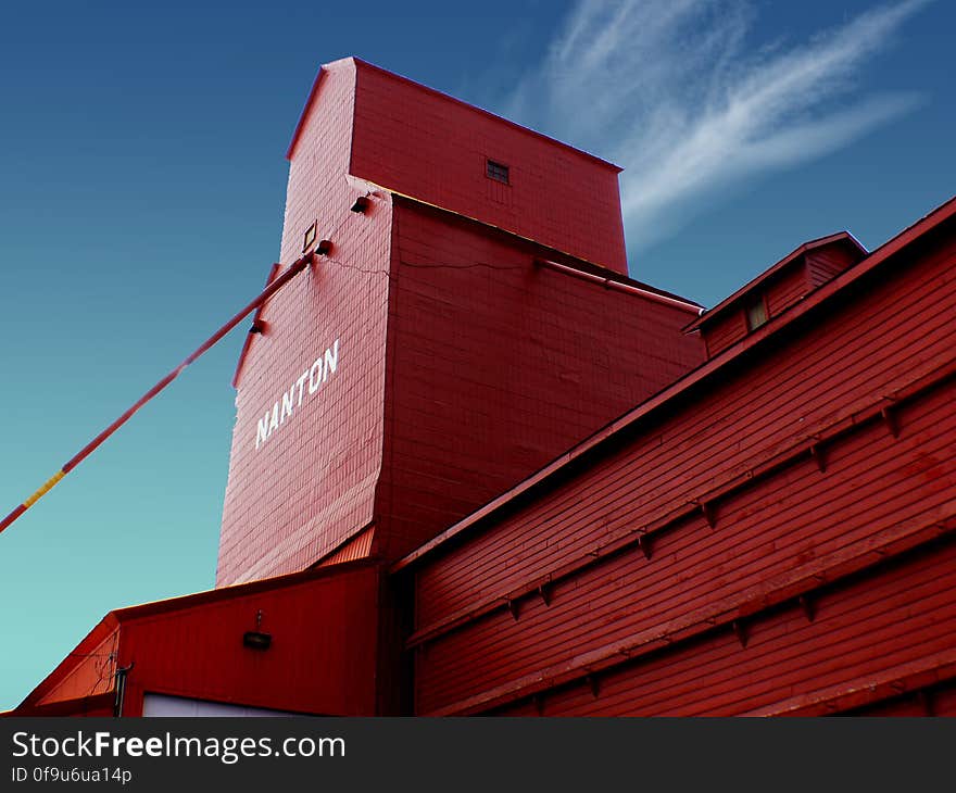 The Canadian Grain Elevator Discovery Centre is a set of restored grain elevators located in Nanton, Alberta, Canada. The centre&#x27;s goal is to preserve examples of old grain elevators to educate visitors about the town&#x27;s, and Alberta&#x27;s, agricultural history. In 2001 the last of Nanton’s grain elevator row was threatened by demolition because of recent abandonment of the Canadian Pacific Railway that the elevators stood next to. Many worried citizens in and around the town of Nanton had realized that a part of the town&#x27;s and province&#x27;s history was about to be torn down and lost forever. The Canadian Grain Elevator Discovery Centre is a set of restored grain elevators located in Nanton, Alberta, Canada. The centre&#x27;s goal is to preserve examples of old grain elevators to educate visitors about the town&#x27;s, and Alberta&#x27;s, agricultural history. In 2001 the last of Nanton’s grain elevator row was threatened by demolition because of recent abandonment of the Canadian Pacific Railway that the elevators stood next to. Many worried citizens in and around the town of Nanton had realized that a part of the town&#x27;s and province&#x27;s history was about to be torn down and lost forever.