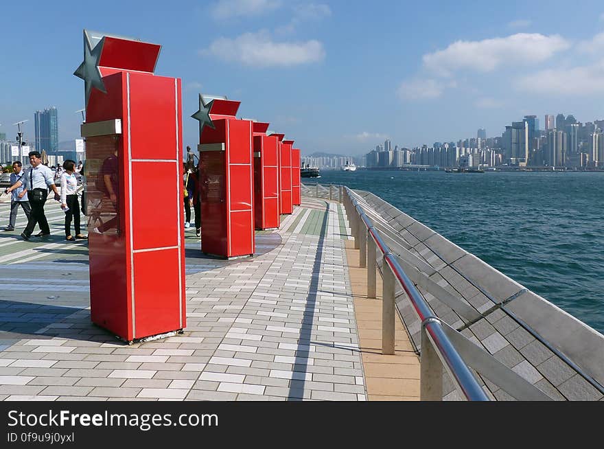 Thanks to the efforts of Hong Kong’s movie industry over the past century, many in Asia and farther afield are familiar with the city’s sights before they’ve even set foot here. The Avenue of Stars pays tribute to the names that helped make Hong Kong the ‘Hollywood of the East’, while giving visitors a panoramic view of the city’s most iconic sight: its glorious skyline, dramatically set against The Peak. With commemorative plaques, celebrity handprints, descriptive milestones, movie memorabilia, a life-size statue of kung fu action hero Bruce Lee and a bronze rendering of popular cartoon character McDull, the Avenue of Stars fittingly sets the glamor of Hong Kong’s film industry against the captivating dazzle of Victoria Harbor. Thanks to the efforts of Hong Kong’s movie industry over the past century, many in Asia and farther afield are familiar with the city’s sights before they’ve even set foot here. The Avenue of Stars pays tribute to the names that helped make Hong Kong the ‘Hollywood of the East’, while giving visitors a panoramic view of the city’s most iconic sight: its glorious skyline, dramatically set against The Peak. With commemorative plaques, celebrity handprints, descriptive milestones, movie memorabilia, a life-size statue of kung fu action hero Bruce Lee and a bronze rendering of popular cartoon character McDull, the Avenue of Stars fittingly sets the glamor of Hong Kong’s film industry against the captivating dazzle of Victoria Harbor.