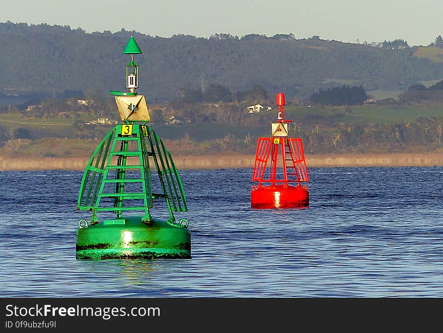 Channel Markers These show well-established channels and indicate port &#x28;left&#x29; and starboard &#x28;right&#x29; sides of the channels. Port marks A red can shape. At night, a red flashing light may be shown. Starboard mark A green conical shape. At night a green flashing light maybe shown. Coming In Rule When entering harbour &#x28;up stream&#x29; the red port mark should be kept on the boat&#x27;s port &#x28;left&#x29; side the green mark on the boat&#x27;s starboard &#x28;right&#x29; side. Going Out Rule When leaving harbour &#x28;down stream&#x29; the red port mark should be kept on the boat&#x27;s starboard &#x28;right&#x29; side and the green mark on the boat&#x27;s port &#x28;left&#x29; side. Channel Markers These show well-established channels and indicate port &#x28;left&#x29; and starboard &#x28;right&#x29; sides of the channels. Port marks A red can shape. At night, a red flashing light may be shown. Starboard mark A green conical shape. At night a green flashing light maybe shown. Coming In Rule When entering harbour &#x28;up stream&#x29; the red port mark should be kept on the boat&#x27;s port &#x28;left&#x29; side the green mark on the boat&#x27;s starboard &#x28;right&#x29; side. Going Out Rule When leaving harbour &#x28;down stream&#x29; the red port mark should be kept on the boat&#x27;s starboard &#x28;right&#x29; side and the green mark on the boat&#x27;s port &#x28;left&#x29; side.