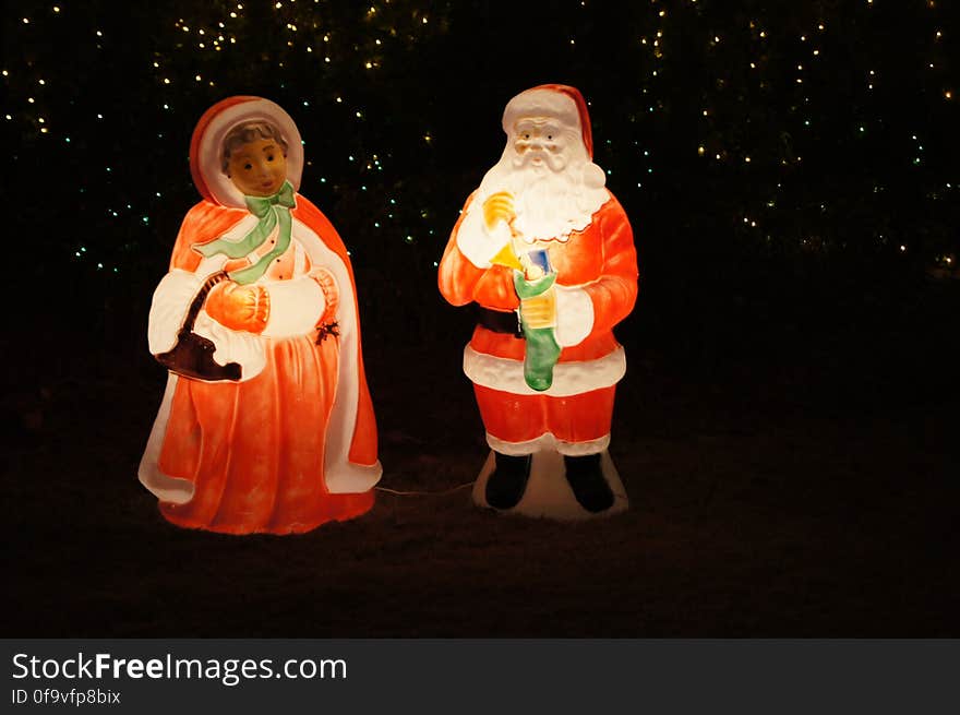 Christmas ornament, Santa claus, Window, Christmas decoration, Toy, Ornament