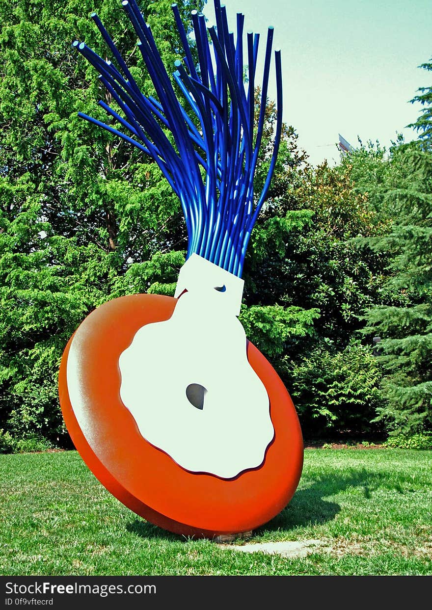 Sculpture in the Smithsonian Sculpture Garden on Constitution Ave, Washington, DC.. Titled Typewriter Eraser, Scale X, it is a whimsical piece of art by Claes Oldenburg and Coosje van Bruggen. www.nga.gov/feature/sculpturegarden/sculpture/index.shtm Leica D-3.