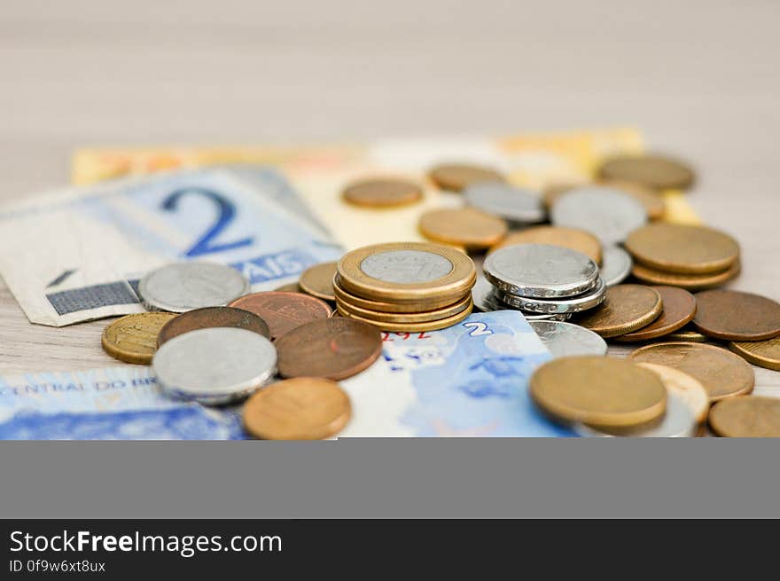 Bunch of Bronze and Silver Coin and Banknote