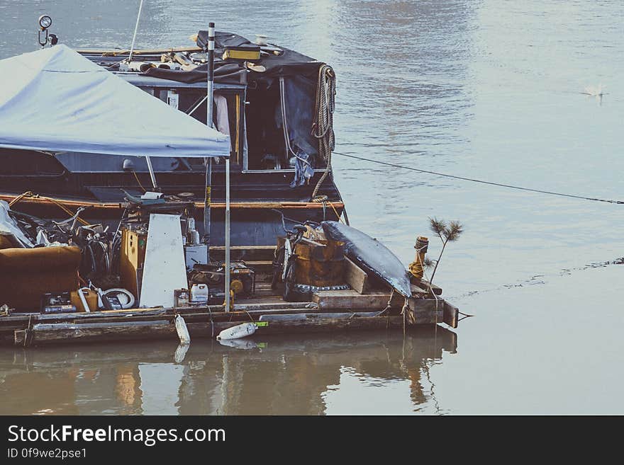 Old boat floating on a lake.