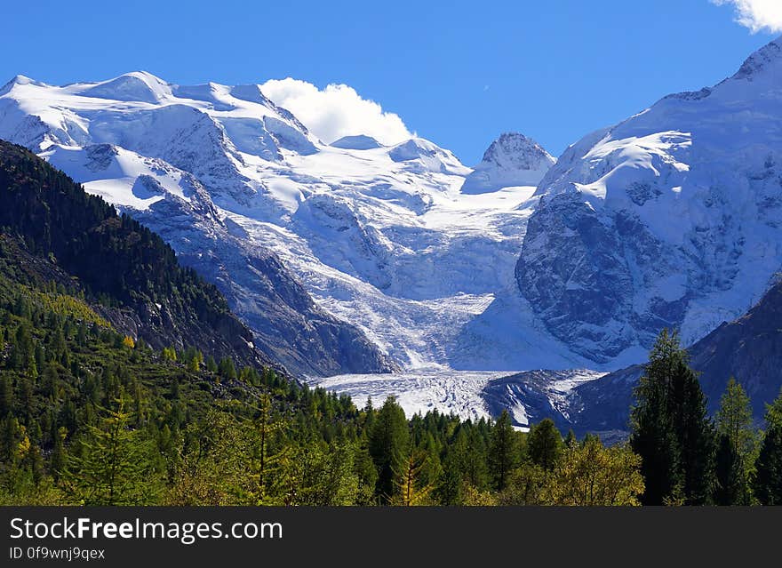 Scenic View of Mountains Against Clear Blue Sky