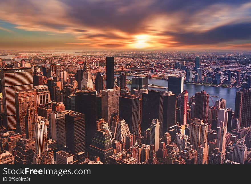 High Angle View of Cityscape Against Cloudy Sky