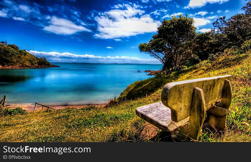 Scenic View of Sea Against Blue Sky