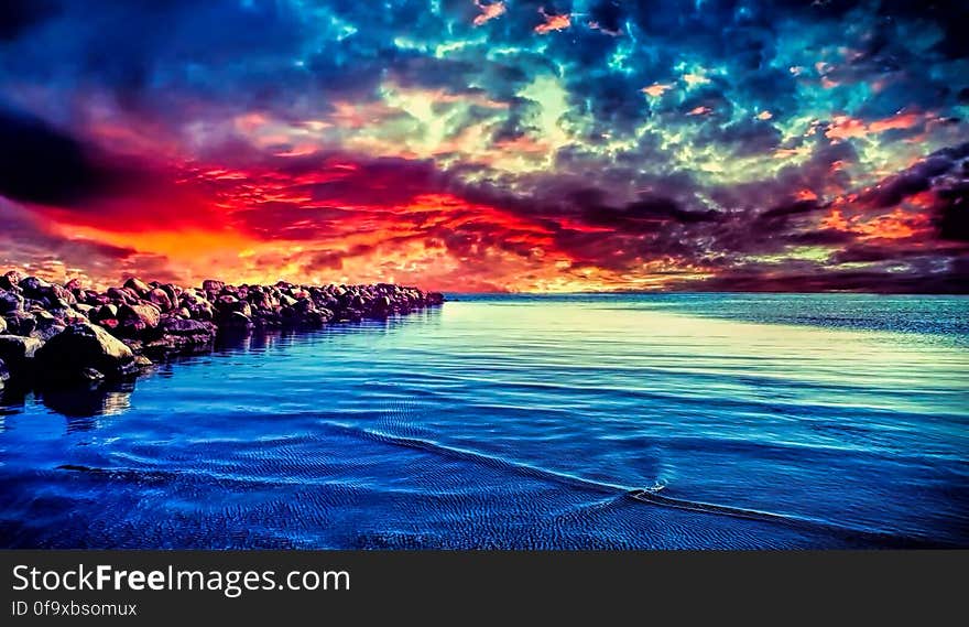 Scenic View of Sea Against Dramatic Sky