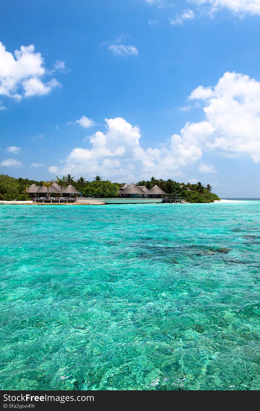 Lagoon and beach bungalows on Maldives Island