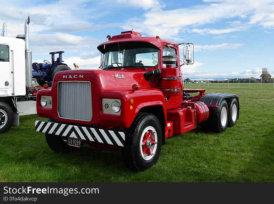 Christchurch truck show. The Mack R Model was a Class 8 heavy-duty truck first introduced in the early 1960s by Mack Trucks, to replace the very successful Mack B Model.[1] Its production ran for 40 years until the RD model was discontinued in 2002 and the RB and DM models were discontinued in 2005. The first R models introduced were powered by Mack Thermodyne diesel and gasoline engines. In 1973 the R cab was given a makeover to include a deeper rear wall for more room and a new dashboard design. Christchurch truck show. The Mack R Model was a Class 8 heavy-duty truck first introduced in the early 1960s by Mack Trucks, to replace the very successful Mack B Model.[1] Its production ran for 40 years until the RD model was discontinued in 2002 and the RB and DM models were discontinued in 2005. The first R models introduced were powered by Mack Thermodyne diesel and gasoline engines. In 1973 the R cab was given a makeover to include a deeper rear wall for more room and a new dashboard design.